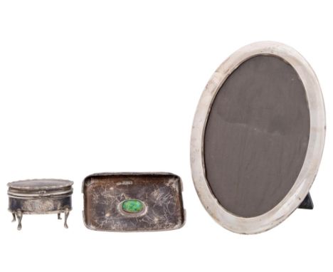Nelson Dawson. An Arts and Crafts silver and enamel dish, on four feet, 96mm l, maker's mark London 1905, a silver trinket bo