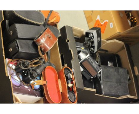 Collection of binoculars (10) and cine cameras (4) includes vintage brands and two Bel and Howell Super 8's