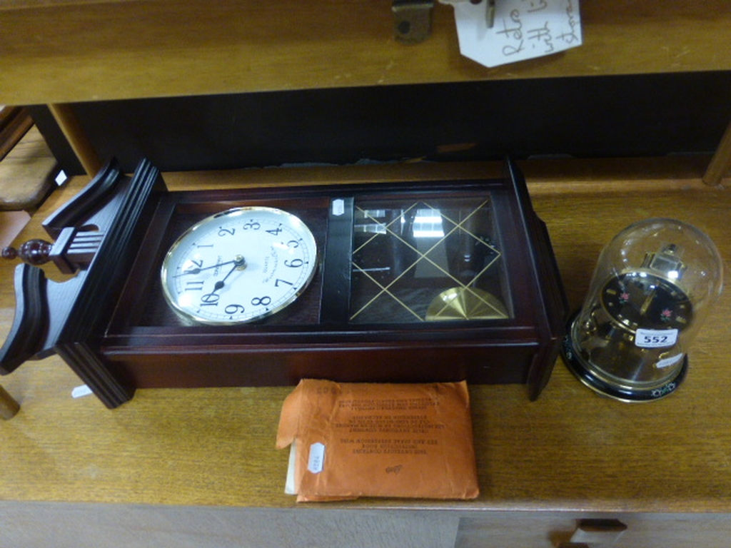 Constant Quartz Westminster Chime Hanging Wall Clock together with a