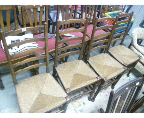 Set of four late Victorian oak ladder back chairs  