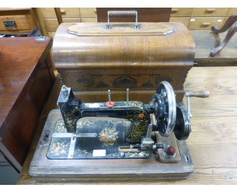 Two vintage sewing machines including Sereta