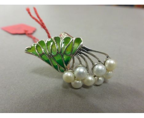 An unusual silver enamel and freshwater pearl ring