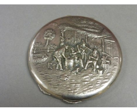 Dutch white metal compact stamped Zippla 90 with embossed figurative decoration to lid