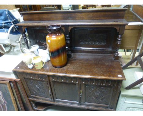 Early 20th century Jacobean Oak Sideboard with Carved Back and Shelf and Pot Shelf below 