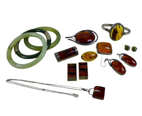 A collection of amber and jade jewellery, including a 9ct yellow gold opal brooch (2.2g). (1 bag)
