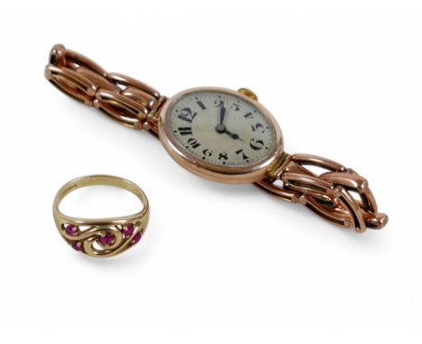 A 9ct gold cased cocktail watch, 20.7g gross, together with a 9ct gold five stone ruby style stone ring, size P/Q, 2.94g. (1 