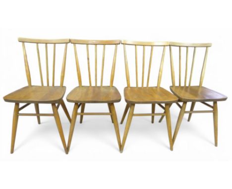 A set of Ercol stick-back and elm-seated dining chairs, design number 884923, 39 by 43 by 79cm high.