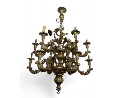 A Rococo style ten branch gilt chandelier, with acanthus scroll decoration, 80 by 80 by 110cm high.
