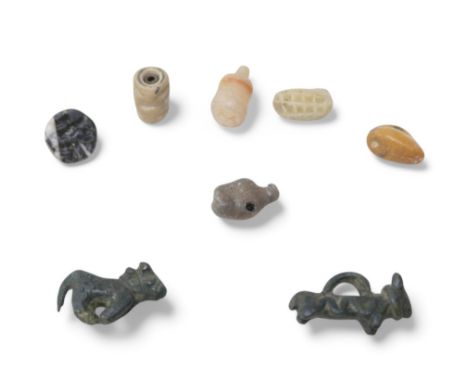 Eight various ancient beads, possibly some pre Roman, including bronze animals, largest 3cm long, as well hardstone and intag