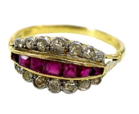 An 18ct yellow gold diamond and ruby ring, set with three rows, ring size R, weight 2.9g.