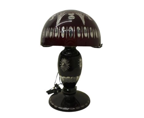 A ruby overlay cut glass table lamp and shade, 30cm diameter by 46cm high.