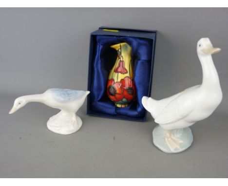 Boxed Old Tupton ware jug, a Nao figure of a duck and one other