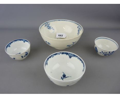 First period Worcester &amp; Caughley group of four bowls to include a 7.5 cms teabowl, three flowers pattern with blue cresc