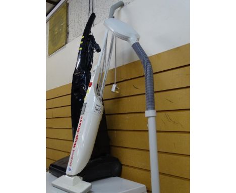 Upright Electrolux vacuum cleaner, Bissell Magicbroom and modern standard lamp E/T