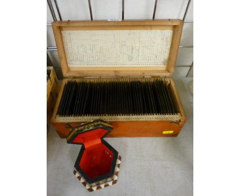 Vintage lidded box of glass photographic negatives and a modern decorative trinket box 