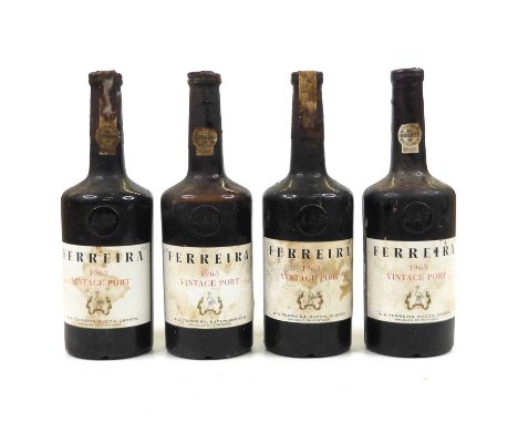 Ferreira vintage port, 1963, four bottlesAll with some crusting’ around capsules.Levels upper body, not into shoulder.Some st