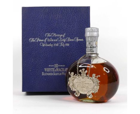 Whyte &amp; Mckay Deluxe 12 Year Old Blended Scotch Whisky, 75cl, 40°, one bottle in commemorative carton