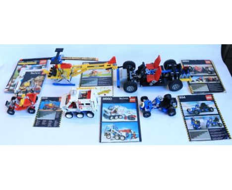 Five vintage Lego Technics sets to include 852 helicopter, 854 racing cart, 8660 snow vehicle, 8845 dune buggy and 8860 car c