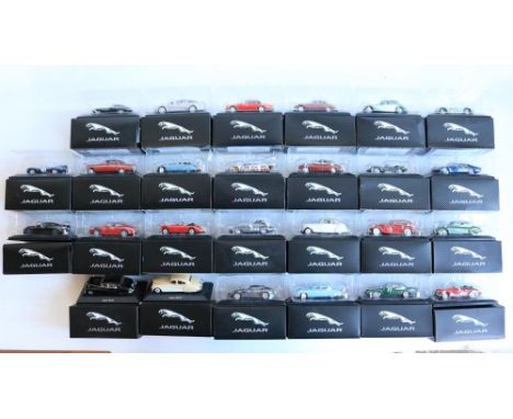 Twenty six boxed 1/43 scale diecast Jaguar car models from Atlas Editions, (2 missing internal clear plastic blister packagin