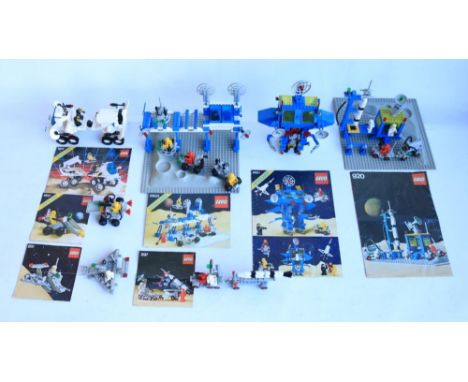 Seven vintage late 1970's-1988 Lego Space sets to include 920 Alpha 1 Rocket Base, 891, 897, 6847, 6925, 6930 and 6951 Robot 
