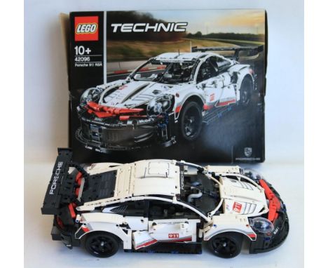 Lego Technic 42096 Porsche 911 RSR, model built up and appears complete, with instruction manual, spare pieces and original p