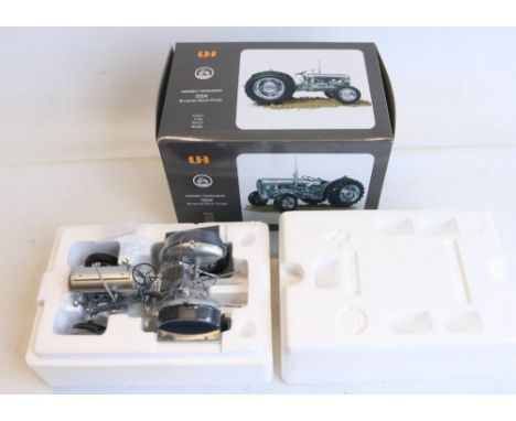 Boxed Universal Hobbies 1/16 scale Massey Ferguson 35X highly detailed diecast tractor model in an attractive brushed silver 