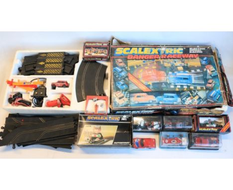 Collection of playworn Scalextric including sets, cars, track (corroded) and accessories, qty, all A/FShipping £68.00 plus va