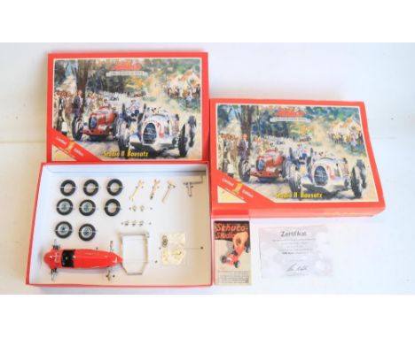 Boxed Schuco modern limited edition (of 1000) Studio II Bausatz tinplate clockwork car kit set (Art.-No 50121700) with red Au