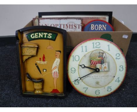 A box of contemporary wall plaques, metal tin drum Toy Company advertising clock, etc 