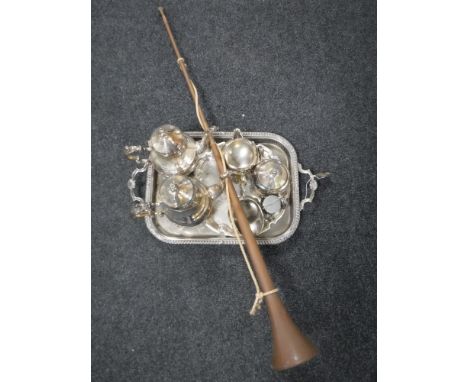 A plated twin handled serving tray, four piece American E. B. Rogers plated tea service, assorted plated ware and a copper hu