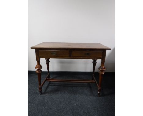 A late 19th century mahogany writing desk fitted two drawers 