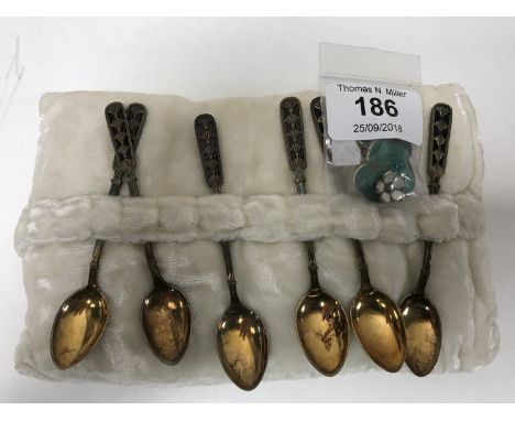 Six silver gilt black enamel spoons by David Andersen and a pair of silver two-colour enamel earrings by David Andersen