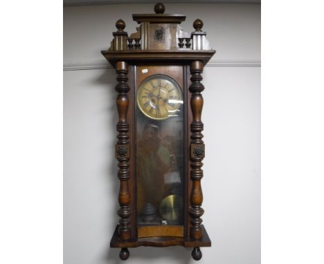 A mahogany cased Vienna wall clock 
