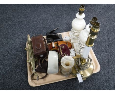 A pair of marble lamp bases, 20th century alarm clock, camera in leather case, crocodile nut cracker and an antique punch 