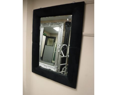 A black cushion framed mirror and a black gloss side table (2) 