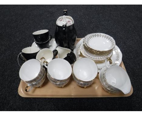 A tray of a fifteen piece Johnson Brothers tea service and a further twenty one piece Queen Anne bone china tea service 