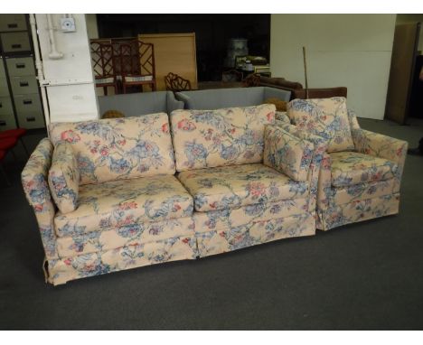 A two seater settee and armchair in floral print 