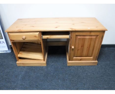 A contemporary pine computer desk