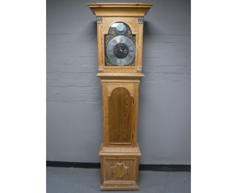 An oak longcase clock with pendulum and weights 