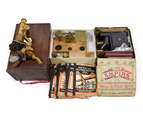 Various Instruments including a Student microscope (cased) The Empire Magic Lantern Outfit (in original box) Balance scale wi