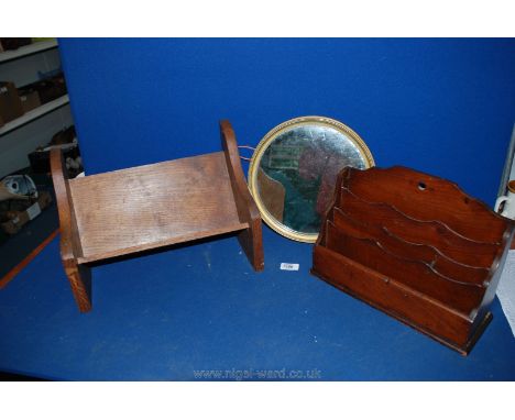 An Oak book shelf, along with a Letter Rack and a small circular mirror.