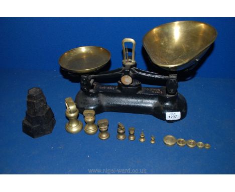 A Librasco, vintage weighing scales, cast iron with brass pan and dish, two sets of weights, in brass and cast iron.