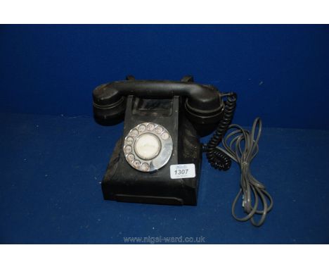A Vintage Bakelite telephone.