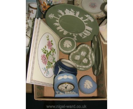 A quantity of blue and green Wedgwood including pots, trinket dishes, clock, etc along with two modern Royal Worcester tiles