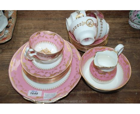 A Twenty Two Piece Mintons Tea Service Decorated with Gilt Garlands on a Pink and White Ground - Pattern No M600.