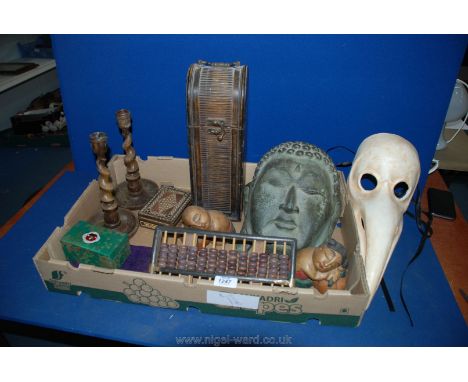 A quantity of miscellanea including Buddha face plaque, a plaque doctor mask, wooden candlesticks, opium scales, boxes, etc. 
