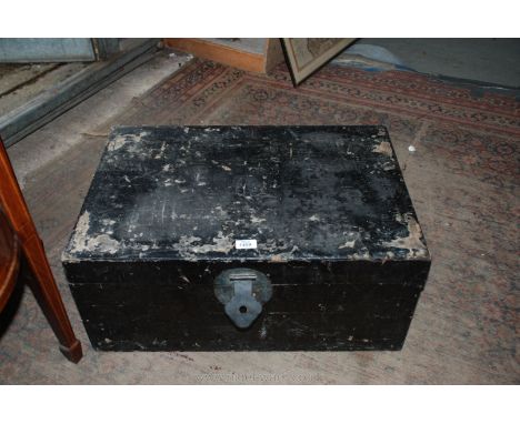 An oriental Trunk with ebonised finish and containing wedding dress, shoes, etc.
