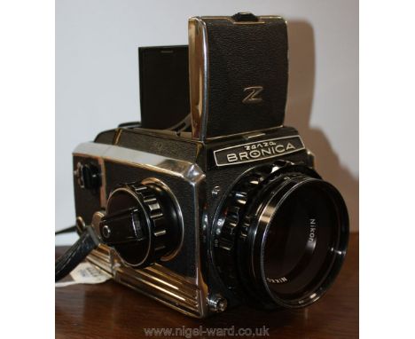 A Zenza Bronica 6x6 120 roll single lens reflex Camera with a Nikon Nikkor-P 75mm f/2.8 and Waist Level Finder, Body No. CB 1