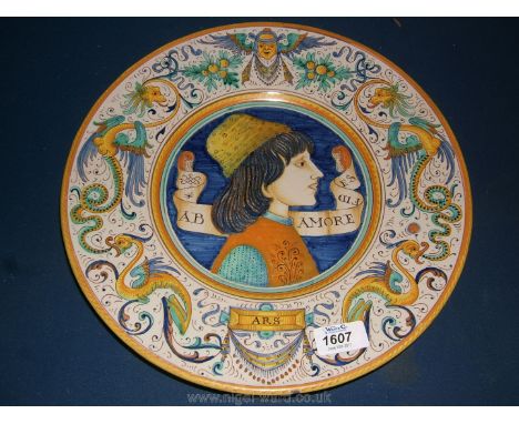 A very fine 19th century Deruta portrait charger painted with the profile head of a gentleman in Renaissance style within a b