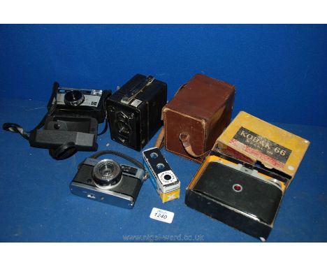 Four vintage Cameras and flash cube pack includes Olympus trip 35.